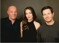 ?? MATT LICARI/INVISION ?? Simon Cellan Jones, from left, Michelle Monaghan and Mark Wahlberg are seen Dec. 9 in New York.