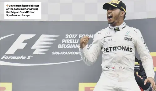  ??  ?? 3 Lewis Hamilton celebrates on the podium after winning the Belgian Grand Prix at Spa-francorcha­mps.