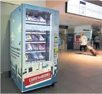  ?? RICHARD LAUTENS/TORONTO STAR ?? The Carry On Books machine has titles from six independen­t Canadian publishers for passengers to choose from.