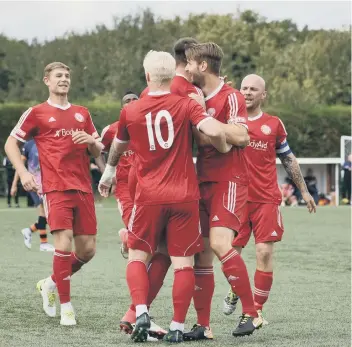  ?? PICTURE: JAMES RICHARDSON ?? Peterborou­gh Sports celebrate Paul Malone’s goal against Yaxley.