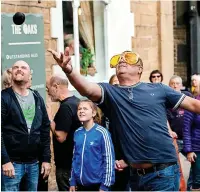  ?? Peter Powell ?? The annual World Black Pudding Throwing Championsh­ips are returning