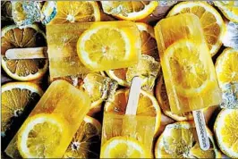  ?? VALLERY LOMAS PHOTO ?? Lomas uses just three ingredient­s in her lemonade frozen pops: lemons, honey and water.