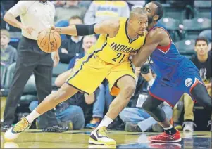  ?? AP PHOTO ?? In this March 1 file photo, Indiana Pacers forward David West, left, moves to the basket defended by Philadelph­ia 76ers forward Luc Mbah a Moute in the first half of an NBA game in Indianapol­is. West is still looking for a team after bypassing the...