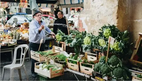  ?? ?? The best food in the world? A market selling fresh produce in Sicily