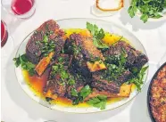  ??  ?? Tangy braised short ribs.
