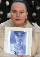  ?? ?? Devastated: Tracy Waters with a photo of her son Jack Mandeville