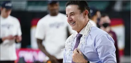  ?? MATT SLOCUM — THE ASSOCIATED PRESS ?? Iona head coach Rick Pitino celebrates after his team defeated Fairfield during the final of the Metro Atlantic Athletic Conference Tournament on Saturday in Atlantic City.