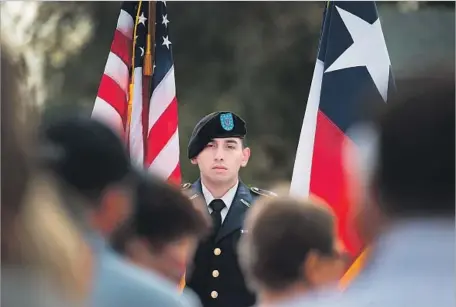  ?? Scott Olson Getty Images ?? ABOUT 100 people attended a Veterans Day ceremony in Sutherland Springs, Texas, six days after the church massacre there.