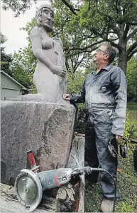  ?? CLIFFORD SKARSTEDT/EXAMINER ?? Owner/operator Andrew Hammond at Hammond Stone Works works on his Laurentian pink granite sculpture titled Green Stockings on Thursday in Peterborou­gh,