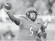  ?? MICHAEL C. JOHNSON, USA TODAY SPORTS ?? Texas Tech quarterbac­k Patrick Mahomes started 12 games and led the Football Bowl Subdivisio­n this season with 5,052 passing yards. He threw for 41 touchdowns with 10 intercepti­ons.