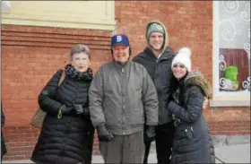  ?? NICHOLAS BUONANNO- NBUONANNO@TROYRECORD.COM ?? The Ward family enjoys the Hoosick Falls St. Patrick’s Day parade Saturday afternoon, from left, June Ward, Jim Ward, Joey Ward and Taylor Nessore.