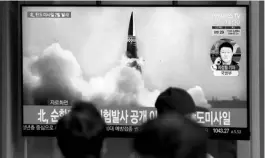  ?? PHOTO: AP/PTI ?? People in Seoul watch a news programme reporting about North Korea's missile test. Kim Yo Jong, Kim Jong Un's sister , has warned of “destructio­n” of bilateral ties