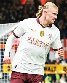  ?? — AFP file photo ?? Manchester City’s striker Haaland celebrates after scoring his team third goal during the English FA Cup fifth round match against Luton Town at Kenilworth Road stadium in Luton, central England.