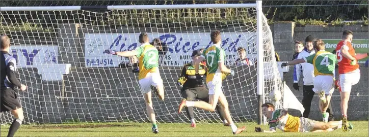  ??  ?? Shane Howard powers home a decisive goal for Fingallian­s.