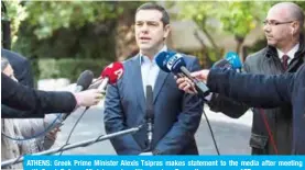  ??  ?? ATHENS: Greek Prime Minister Alexis Tsipras makes statement to the media after meeting with Greek Defense Minister and coalition partner Panos Kammenos. — AFP