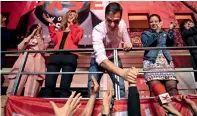  ?? AP ?? Prime Minister and socialist Party leader Pedro sanchez shakes hands with supporters in Madrid. —