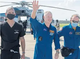  ?? Picture: AP. ?? Nasa astronaut Douglas Hurley waves to onlookers at Naval Air Station, Pensacola.