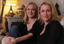  ?? JAI STOKES ?? “We: A Manifesto for Women Everywhere” coauthors Jennifer Nadel (left) and Gillian Anderson.