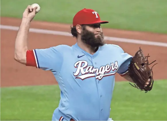  ?? KEVIN JAIRAJ/USA TODAY SPORTS ?? Pitcher Lance Lynn, who went into his start Monday at 3-0 with a 1.37 ERA, could be the highest-profile starter to hit the market if the Rangers decide to be sellers.