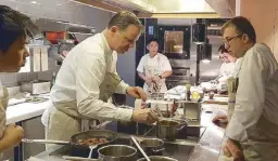 ??  ?? Culinary geniuses at work: Richard Ekkebus and Chele Gonzalez.