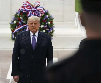  ?? AP ?? ON THE CLOCK: President Trump participat­es in Wednesday’s Veterans Day ceremony at the Tomb of the Unknown Soldier at Arlington National Cemetery. Trump’s lawsuits are growing, with an eye to stall the deadline to certify election results.