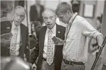  ?? Al Drago / New York Times ?? Sen. Chuck Grassley, R-Iowa, left, a member of the Senate Finance Committee, said some Democrats are interested in pursuing a bipartisan effort to overhaul the nation’s tax code.