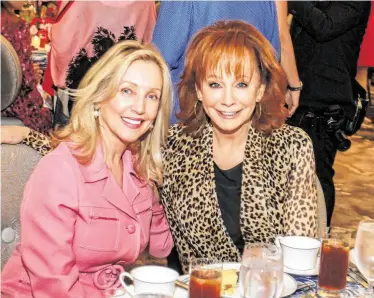  ?? Photos by Gary Fountain / Contributo­r ?? Jona Lindig, left, and Reba McEntire