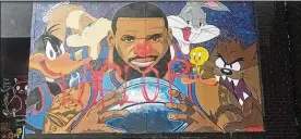  ?? MEGAN BECKA / CLEVELAND.COM ?? Vandals defaced a “Space Jam 2” mural depicting Akron’s hometown hero LeBron James. There have been no arrests.