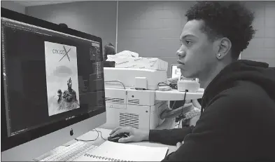  ?? SUBMITTED PHOTOS ?? North Point High School senior Tavis Anderson works on a project in graphics communicat­ions. Anderson plans to attend a college specializi­ng in art and design where he wants to study animation.