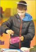  ?? Pictures: Andy Jones FM4615470/FM4615474 ?? From left: Danny North, Emily Pantony, Kezzie North and Max Edwards enjoy the Christmas lanterns workshop at Barming Village Hall