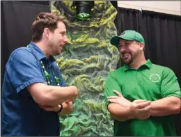  ?? The Sentinel-Record/Grace Brown ?? CELEBRITIE­S: Official parade starter John Heder, left, and celebrity grand marshal Joey Fatone visit during the VIP Party for the First Ever 15th Annual World’s Shortest St. Patrick’s Day Parade on Saturday at the Hot Springs Convention Center.