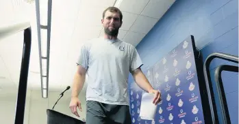  ?? AJ MAST/ASSOCIATED PRESS ?? Colts quarterbac­k Andrew Luck exits a news conference Saturday after announcing his retirement from football.