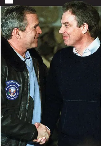  ??  ?? Deal: Tony Blair and George Bush shake hands following a summit in the US in 2001