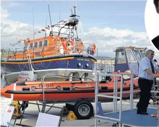  ??  ?? ● Pwllheli’s new inshore lifeboat, the Robert Wright, named after its former coxswain who died in 2015 while out to sea on a rescue mission, was dedicated at a special ceremony on Saturday. RNLI chairman Alan Jones was among the speakers and Band...