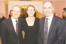  ??  ?? From left: James Clements, senior vice-president strategic planning and technology transforma­tion, Lillian Wiens, and Dr. Todd Anderson.