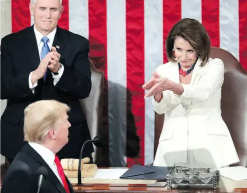  ?? ANDREW HARNIK / THE ASSOCIATED PRESS ?? President Donald Trump turns to House speaker Nancy Pelosi as he delivers his State of the Union address Tuesday night to a joint session of Congress on Capitol Hill in Washington, as Vice President Mike Pence looks on.