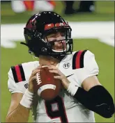  ?? CARLOS OSORIO — THE ASSOCIATED PRESS ?? Ball State quarterbac­k Drew Plitt ranks third in the MAC in completion percentage and yards per game.