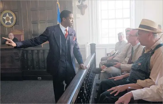  ?? Barry Wetcher Open Road Films ?? THURGOOD MARSHALL (Chadwick Boseman) addresses the jury in “Marshall,” a crowd-pleasing portrait of the future Supreme as a young, traveling lawyer.