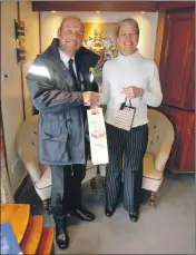  ??  ?? Sarah Kennedy with Captain Trevor Bailey on board the Hebridean Princess.