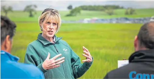  ??  ?? ADVICE: Prof Fiona Burnett, of Scotland’s Rural College, speaking to groups about the crops at the first Arable Scotland event near Dundee