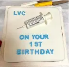  ?? ?? Susanne Haslegrove, left, has worked over 100 shifts as a volunteer at the Bath Racecourse vaccinatio­n centre. Above, a cake to celebrate the first anniversar­y of the centre.