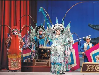  ?? PHOTOS PROVIDED TO CHINA DAILY ?? Above: Peking Opera actress Guo Xiao plays the lead role of Mu Guiying in Female Generals of the Yang Family.Left: Zhang Jiachun from the China National Peking Opera Company portrays the princess Turandot in the Sino-Italian coproducti­on, which will be staged in Italy from Feb 1 to 10.