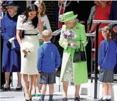  ?? — Reuters ?? Queen Elizabeth and Meghan visit the Storyhouse in Chester.