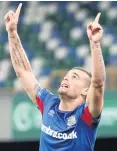  ??  ?? Get in: Matthew Clarke hails his goal against Sutjeska