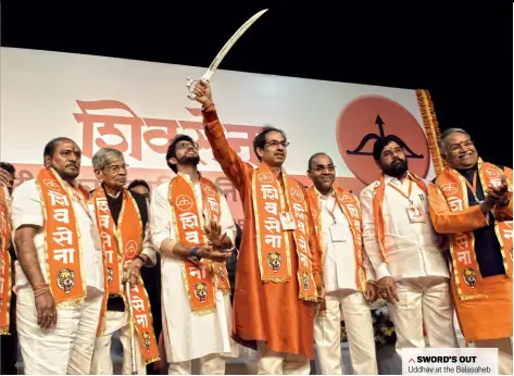  ??  ?? SWORD’S OUT Uddhav at the Balasaheb anniversar­y function