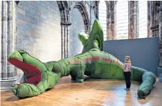  ??  ?? Going green: this huge inflatable dragon will be led through the streets of Edinburgh