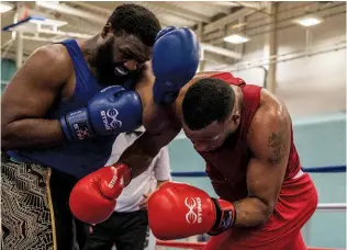  ?? Photo: CLIVE WOOD/ENGLAND BOXING ?? SHOWDOWN: Antwi [left] overcomes top seed and GB boxer Bennett