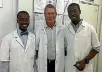  ??  ?? Dr Alex Rutherford with his two interprete­rs, Jean and Leo, at the Medicins Sans Frontieres hospital in Port-au-Prince, Haiti.