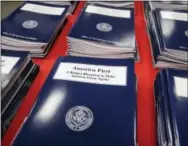  ?? THE ASSOCIATED PRESS ?? Copies of President Donald Trump’s first budget are displayed at the Government Printing Office in Washington.