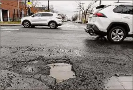  ?? Will Waldron / Times Union ?? “We’re going to have a horrible pothole season,” says Gary Thorington, executive board member of the Superinten­dents Associatio­n.